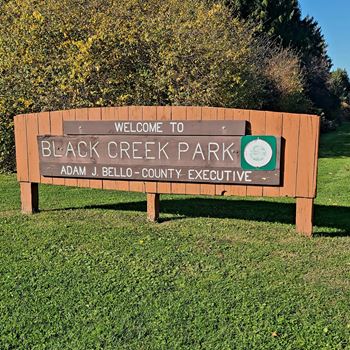 Black Creek Park Entrance sign near Parklands of Chili Apartments